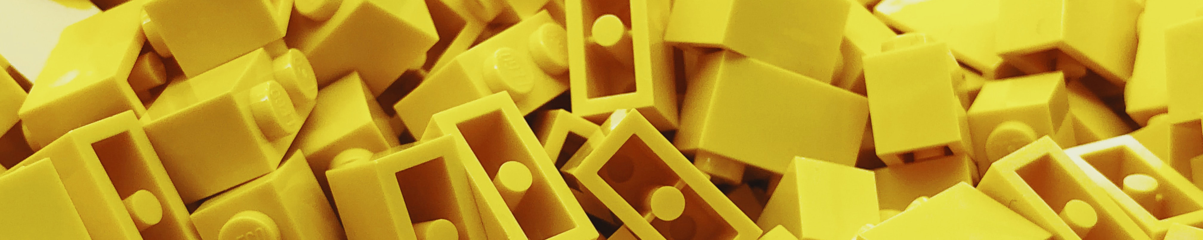"Yellow lego blocks" by Ryan Quintal, CC0